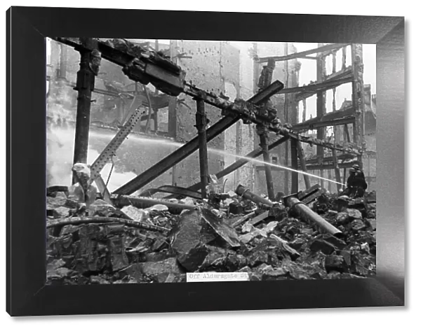 Scenes at Aldersgate Street following an air raid attack. Circa 1941