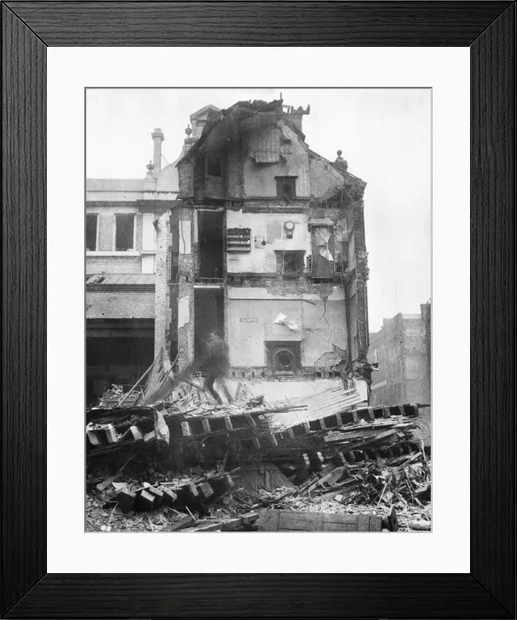 Framed Print : A house demolished in the Liverpool Blitz. At the centre is a clock on the wall Framed Print : A house demolished in the Liverpool Blitz. At the centre is a clock on the wall