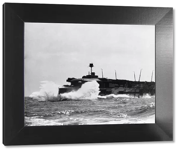 Royal Navy Aircraft carrier HMS Furious in a rough seaway during the Second World War