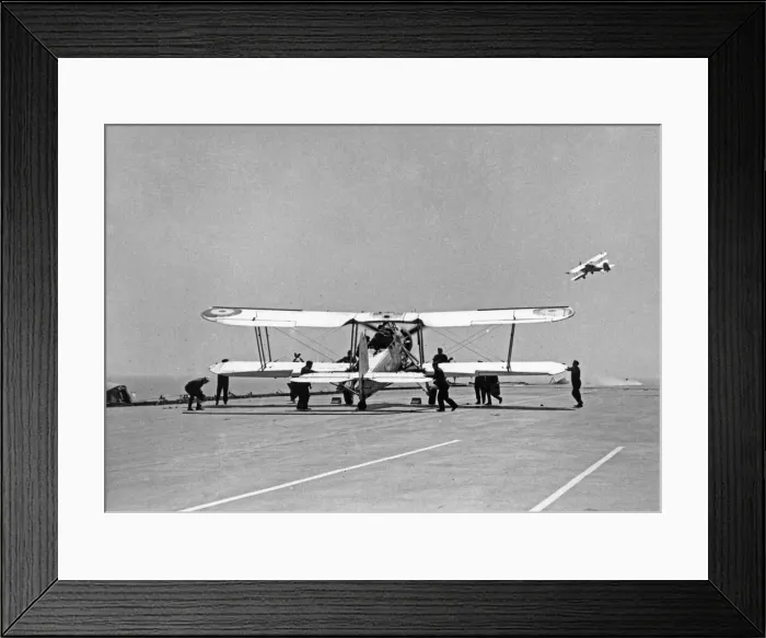 Framed Print : Fairey Swordfish planes launch from the flight deck of the Royal Navy Aircraft Carrier Framed Print : Fairey Swordfish planes launch from the flight deck of the Royal Navy Aircraft Carrier