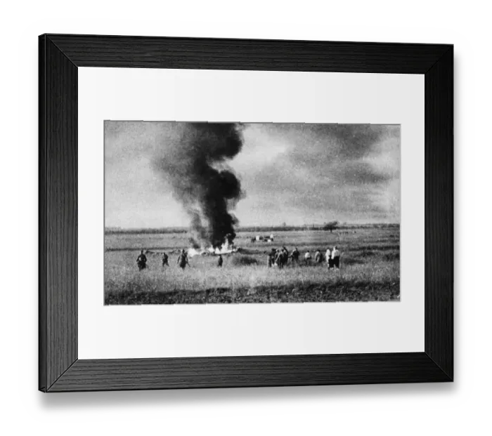 Framed Print : Russian soldiers and collective farmers watch the scattered remains of a German raiding