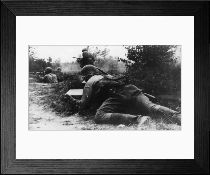Framed Print : A soldier of the Soviet Red Army takes advantage of cover as he creeps towards Framed Print : A soldier of the Soviet Red Army takes advantage of cover as he creeps towards