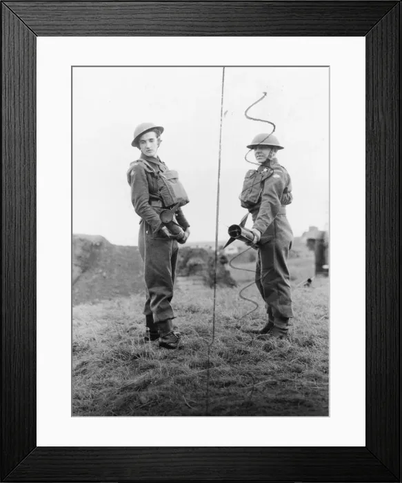 Framed Print : Home guard gunners carrying the rocket shells. Picture taken 8th July 1942 Framed Print : Home guard gunners carrying the rocket shells. Picture taken 8th July 1942