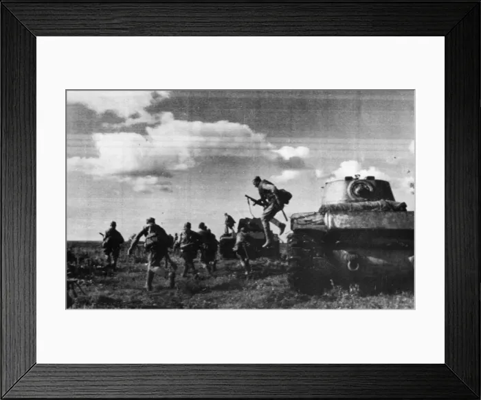 Framed Print : Ae Soviet Red Army raiding party leaping from a tank which carried it into enemy lines