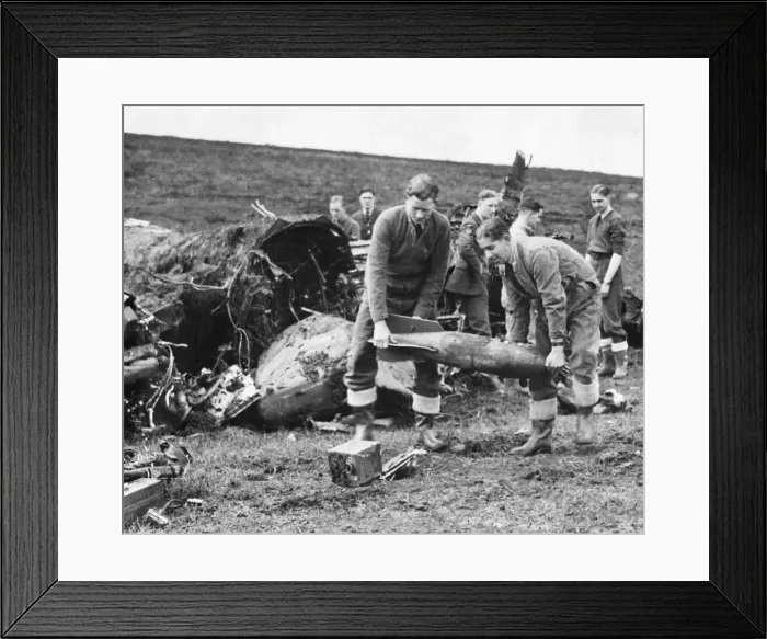 Framed Print : Dangerous task for some of the RAF (Royal Air Force) crash experts unloading the bombs