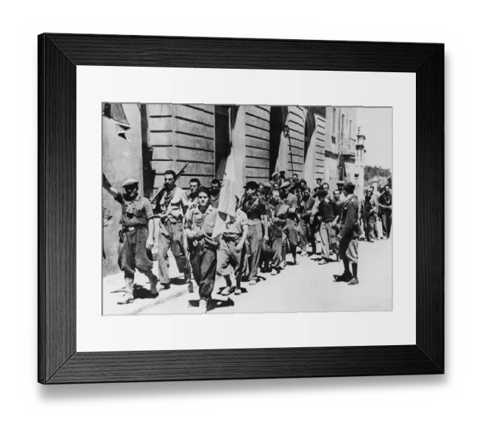 Framed Print : Italian partisans march down the streets of Pomerance after troops of the 5th Army took