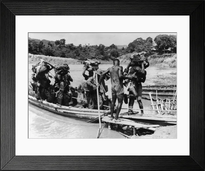 Framed Print : British and West Africans take Burma Village. Picture shows supplies coming ashore