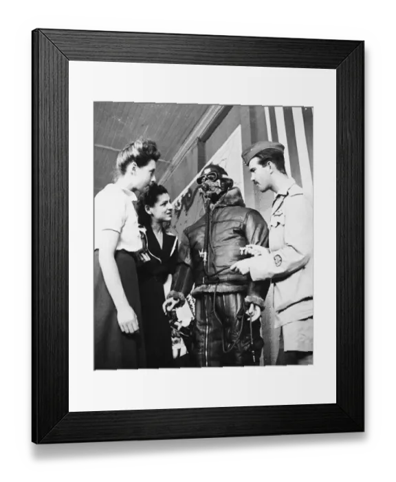 Framed Print : R. A. F. pilot speaking to french women regarding clothing worn by flying men of the R. A. F