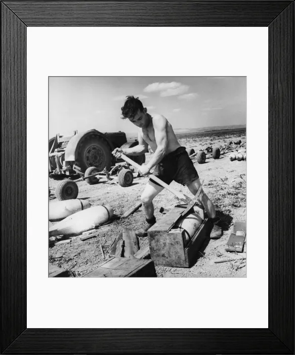 Framed Print : R. A. F armourers at work in Tunisia, preparing airfield. 5th May 1943