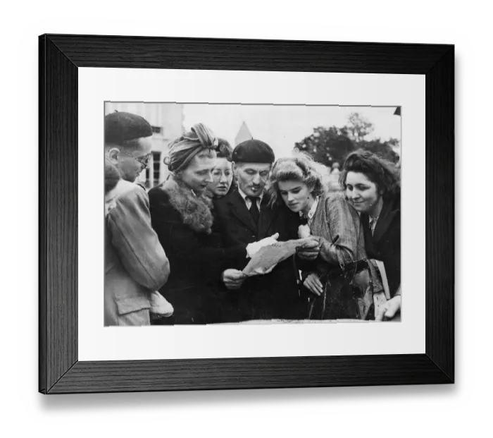 Framed Print : Anxious for news of the outside world, news which has been barred to them for so long