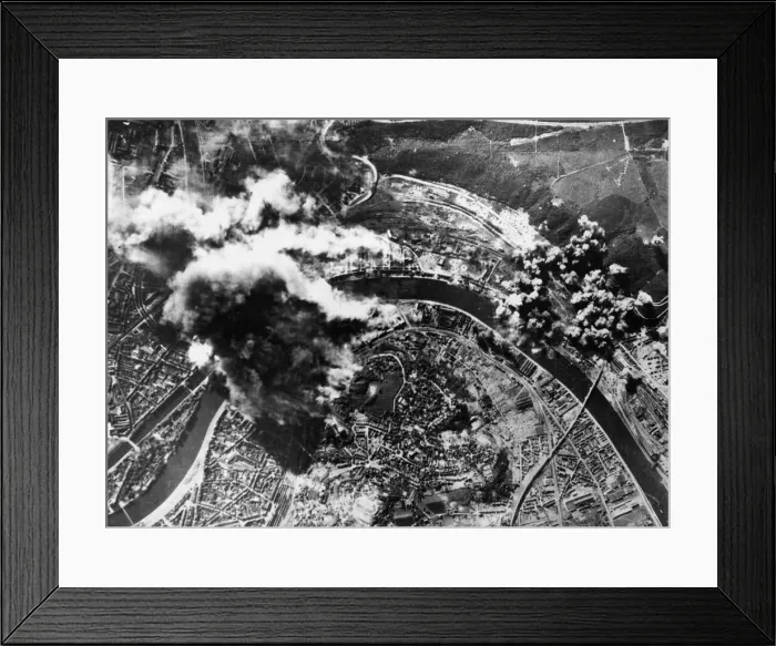 Framed Print : Smoke of varying colours from fires and explosions wings upwards from the marshalling