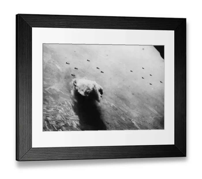 Framed Print : A column of smoke rising several thousand feet in the air over Busigny in occupied France Framed Print : A column of smoke rising several thousand feet in the air over Busigny in occupied France