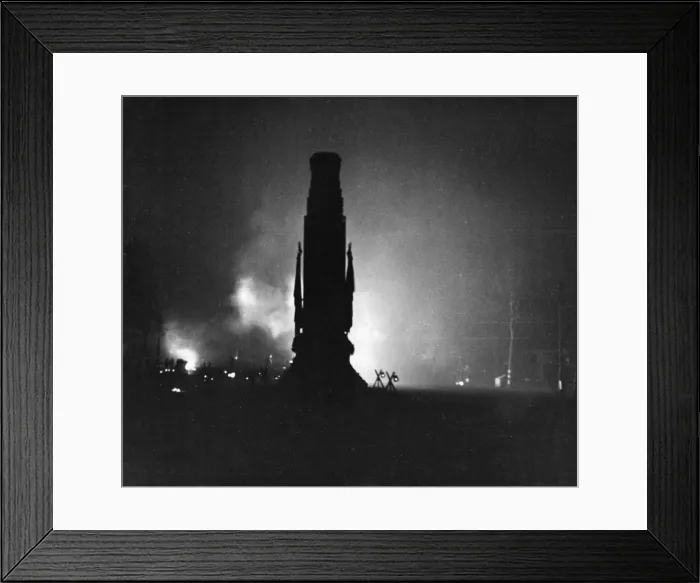 Framed Print : The silhouette of The Cenotaph, Whitehall, London. Flamed billow behind it Framed Print : The silhouette of The Cenotaph, Whitehall, London. Flamed billow behind it