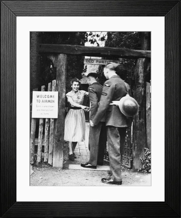 Framed Print : Airmen in Britain. (Picture) Airmen receive a warm welcome to the Old World Garden