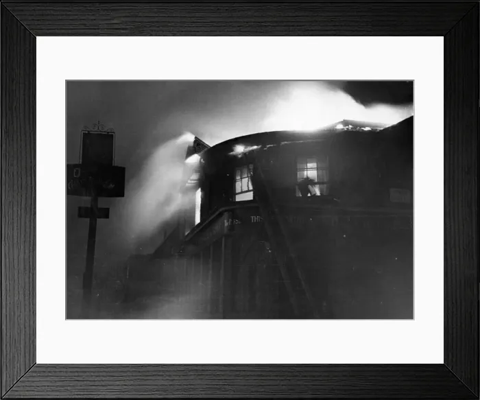 Framed Print : Scenes during the London blitz. A building on fire on Lowth Road, London. Circa 1940 Framed Print : Scenes during the London blitz. A building on fire on Lowth Road, London. Circa 1940