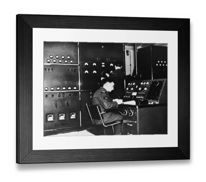 Framed Print : Mechanic at the control desk of a transmitting station. 18th June 1941 Framed Print : Mechanic at the control desk of a transmitting station. 18th June 1941
