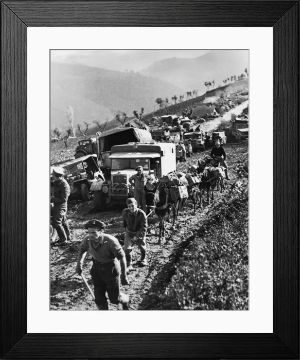 Framed Print : Repairing Fifth Army supply route. Transport held up while the road is repaired Framed Print : Repairing Fifth Army supply route. Transport held up while the road is repaired