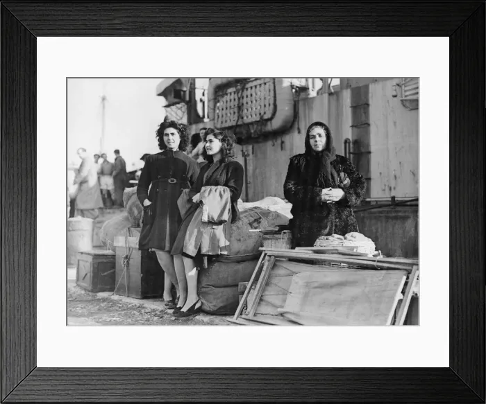 Framed Print : Navy rescues Italian refugees. Refugees, surrounded by the remains of their home Framed Print : Navy rescues Italian refugees. Refugees, surrounded by the remains of their home