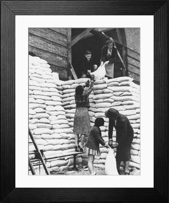 Framed Print : Students help put sandbags in place at Manchester Grammar School Framed Print : Students help put sandbags in place at Manchester Grammar School