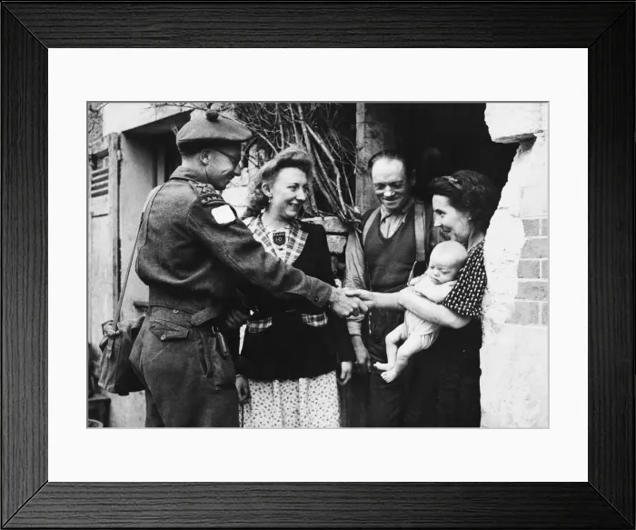 Framed Print : Medical officer Captain Rs Devor after attending to a French womans baby Framed Print : Medical officer Captain Rs Devor after attending to a French womans baby