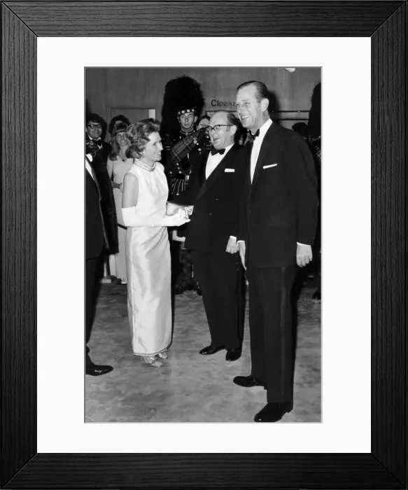 Framed Print : Prince Philip. The Duke of Edinburgh with Mr and Mrs Peter Scott at the premiere of Framed Print : Prince Philip. The Duke of Edinburgh with Mr and Mrs Peter Scott at the premiere of