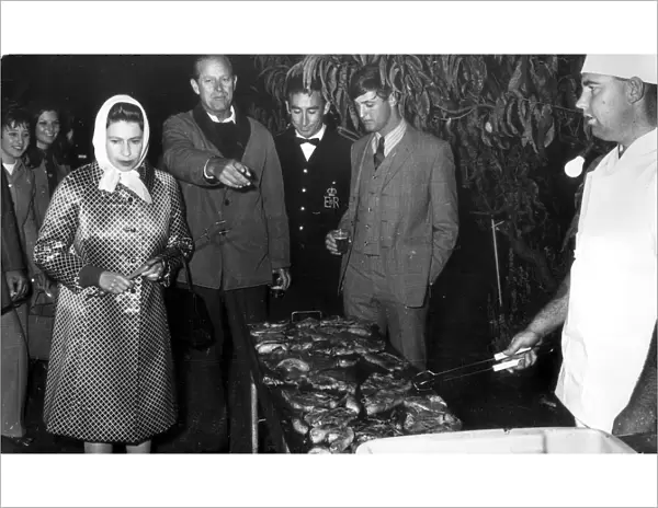 THE DUKE OF EDINBURGH. QUEEN ELIZABETH II AND PRINCE PHILIP ATTEND A BARBEQUE AT