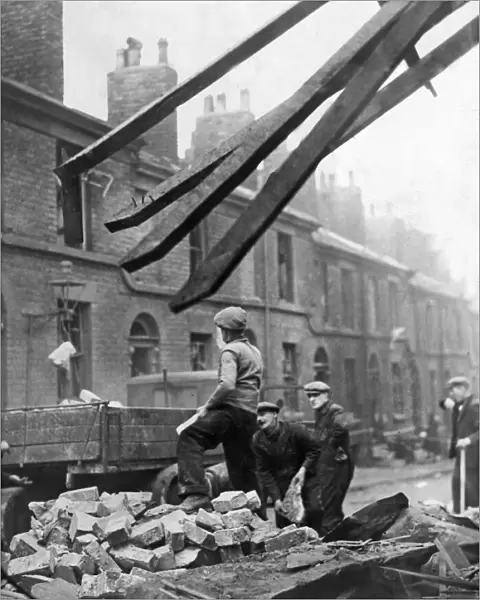 Demolition squads at work after a Nazi Luftwaffe raid on Liverpool and Merseyside