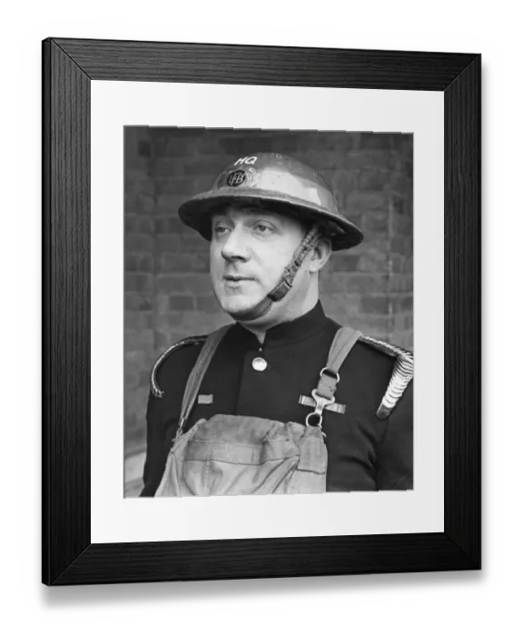 Framed Print : A fireman from The London Fire Brigade. Name unknown