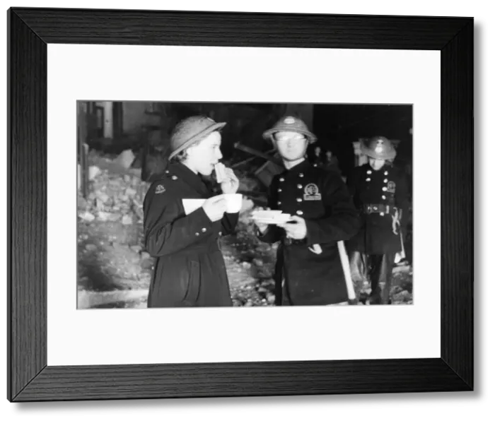 Framed Print : Firemen The London Fire Brigade, taking a well earned break with some sandwiches