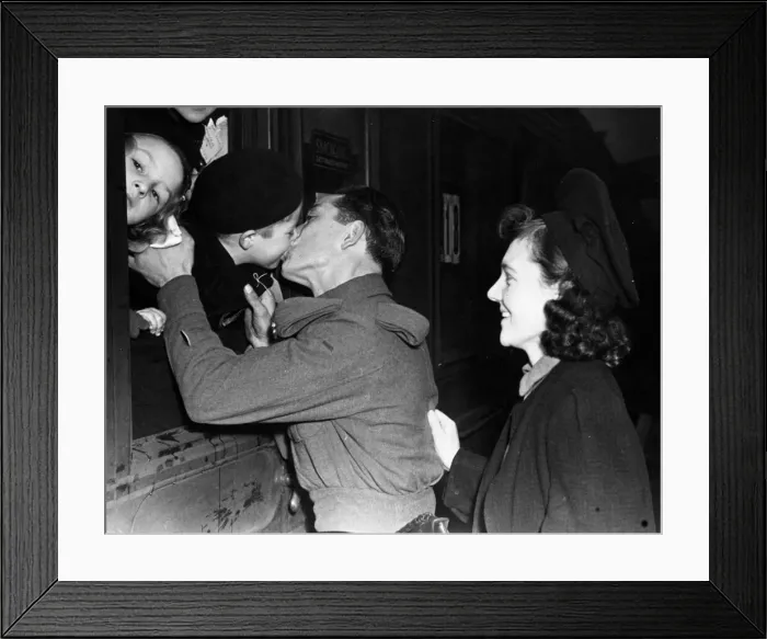 Framed Print : Private Amerelli says goodbye to his son, aged five, he is off to fight and mother Framed Print : Private Amerelli says goodbye to his son, aged five, he is off to fight and mother