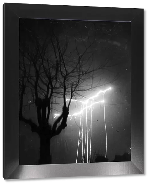 Remarkable picture of parachute flares dropped in London. 29th December 1940