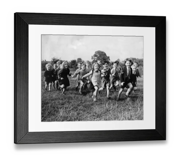 Framed Print : A happy little troupe of London children running to their special classroom in Oxford Framed Print : A happy little troupe of London children running to their special classroom in Oxford