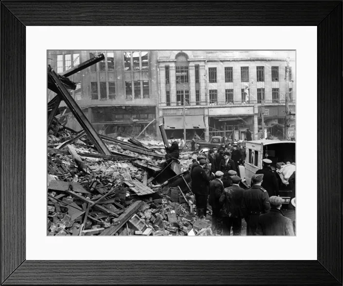 Framed Print : Rescuing wounded at Fitzalan Square, Sheffield. Ambulance taking one of the rescuers who