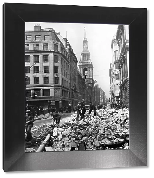 Cheapside, London, following the air raid attacks on 10-11th May 1941
