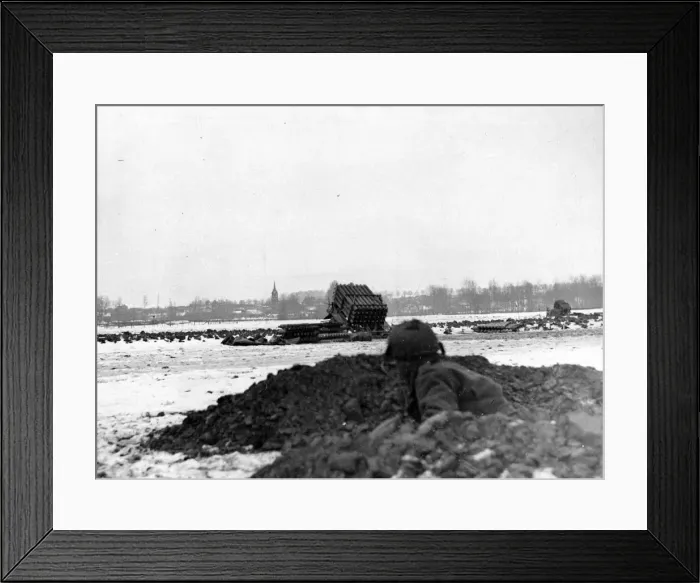 Framed Print : The Armys new rocket weapon. A rocket projector Canadian unit lays down a barrage