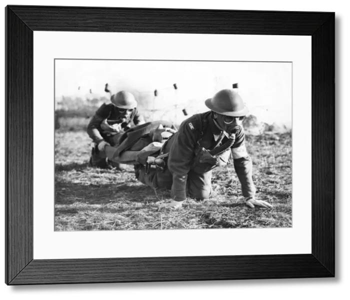 Framed Print : Soldiers carrying the wounded during WWII. 15th February 1941