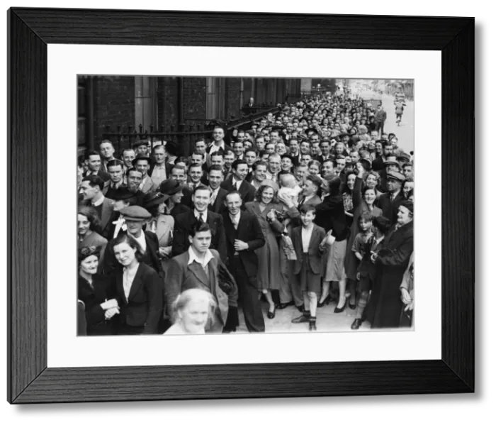 Framed Print : Men of the Twenty - Twenty Five class seen here queuing at a London railway station after Framed Print : Men of the Twenty - Twenty Five class seen here queuing at a London railway station after