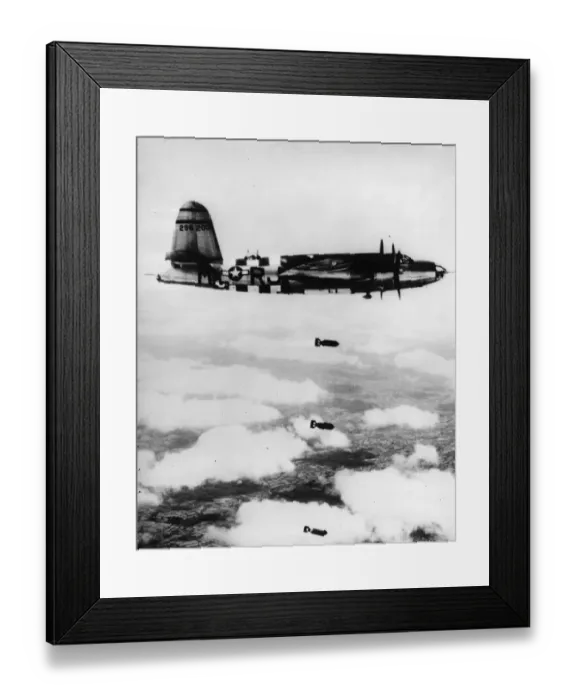 Framed Print : A B-26 Silver Streak Marauder of the ninth US Air Force, unloading its bombs over Torigni Framed Print : A B-26 Silver Streak Marauder of the ninth US Air Force, unloading its bombs over Torigni
