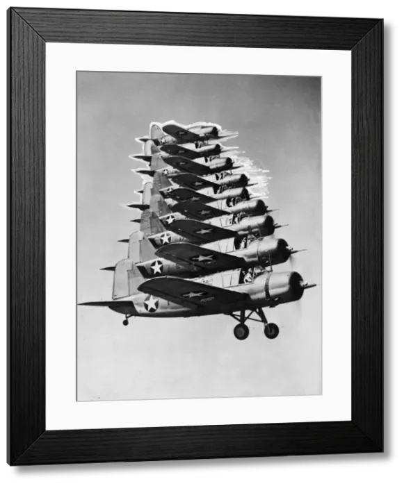 Framed Print : Nine kingfisher scout planes of the United States navy fly in close formation during Framed Print : Nine kingfisher scout planes of the United States navy fly in close formation during
