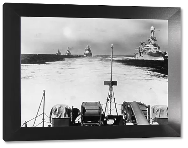 Heavy cruiser of United States Navyin column during manoeuvres off the coast of