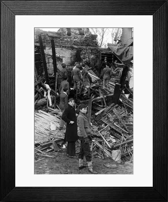 Framed Print : Bombs on Eton College. A view of the masters house which was a fine example of a Wren Framed Print : Bombs on Eton College. A view of the masters house which was a fine example of a Wren