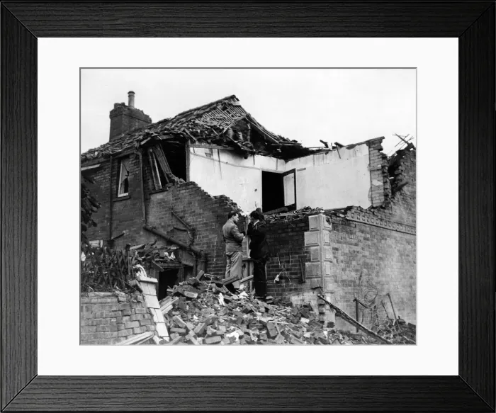 Framed Print : Ted Stocker, who directed the rescue operations, points out where the bombs landed Framed Print : Ted Stocker, who directed the rescue operations, points out where the bombs landed
