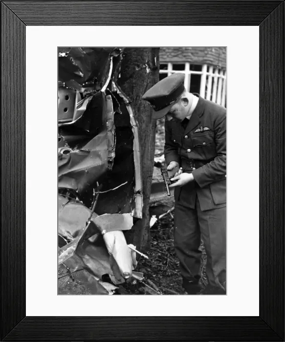 Framed Print : Scenes following a Nazi raid, England. April 1940 Framed Print : Scenes following a Nazi raid, England. April 1940