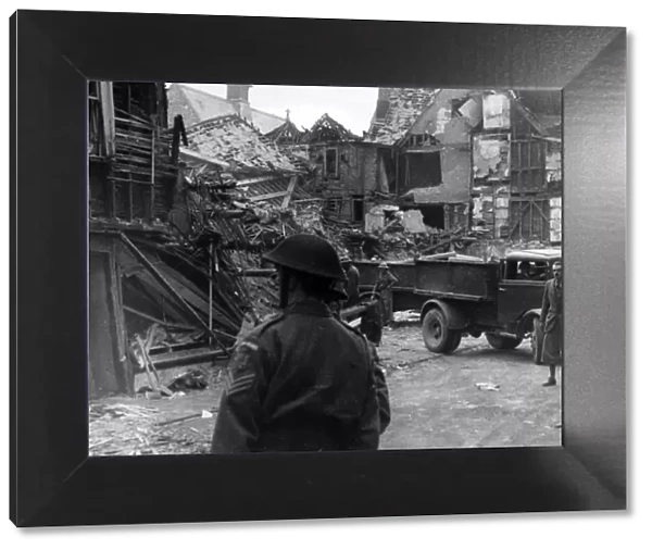 Aftermath of a Nazi raid in Dartmouth, Devon. 26th March 1943