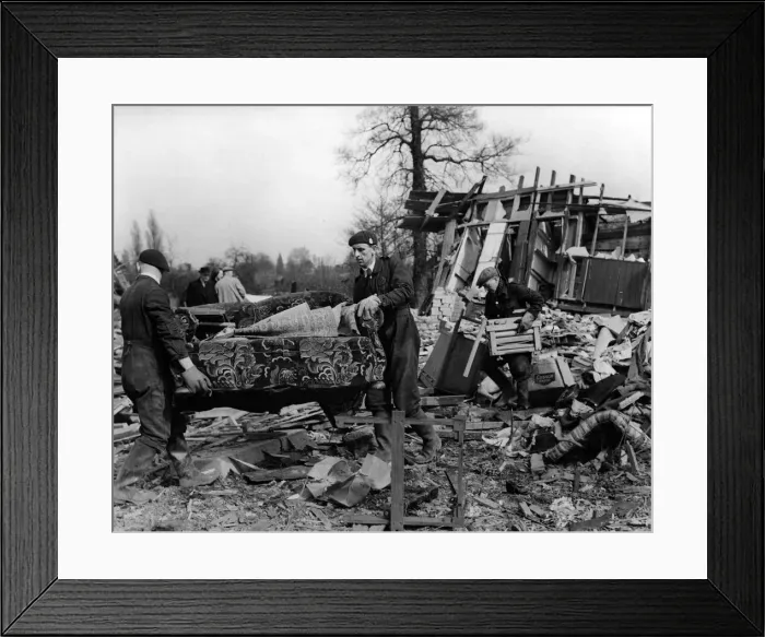Framed Print : ARP rescue workers removing settee from blitzed army huts used as dwellings in a field in Framed Print : ARP rescue workers removing settee from blitzed army huts used as dwellings in a field in