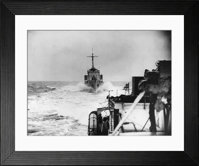 Framed Print : Hunt Class destroyer HMS Southdown of the Royal Navy throwing up a bow wave as follows Framed Print : Hunt Class destroyer HMS Southdown of the Royal Navy throwing up a bow wave as follows
