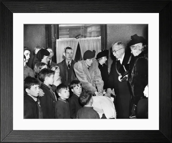 Framed Print : A Liverpool family receive clothing during World War Two