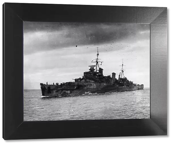 Battlecruiser HMS Sheffield entering harbour during the Second World War