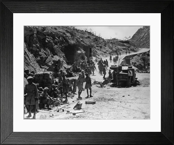 Framed Print : Indian army soldiers at a junction of roads where an Italian lorry can be seen blown Framed Print : Indian army soldiers at a junction of roads where an Italian lorry can be seen blown