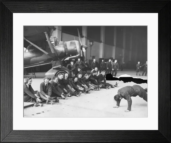 Framed Print : The Womens Auxiliary Air Force (WaF) - enjoying rollerskating in an aircraft hanger Framed Print : The Womens Auxiliary Air Force (WaF) - enjoying rollerskating in an aircraft hanger